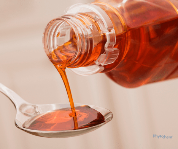 Cough syrup being poured